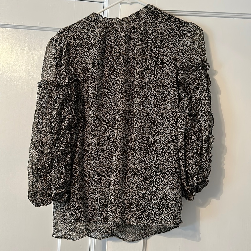 Long sleeve pretty printed blouse.  Size L.  PRICE DROP